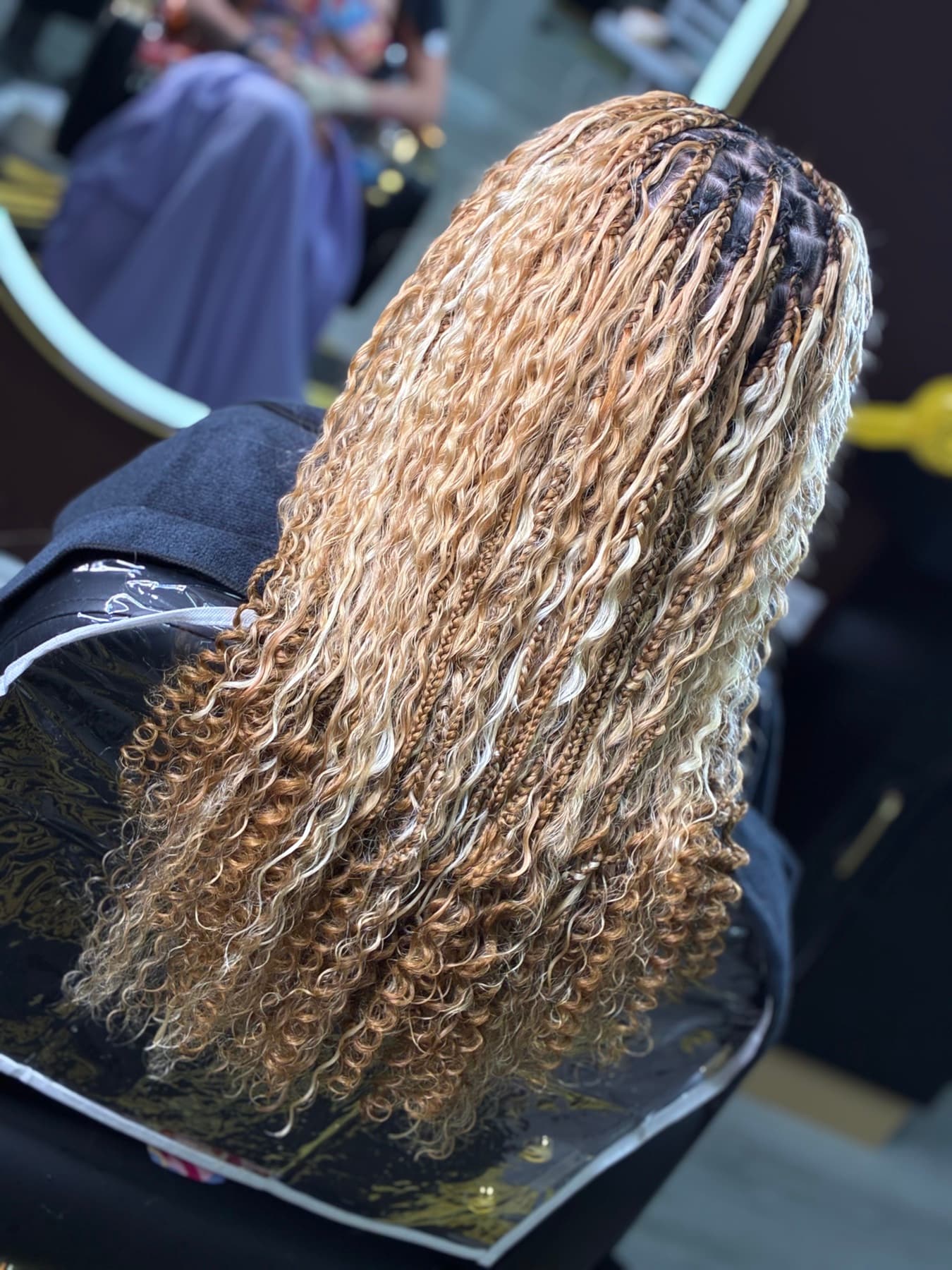 Blonde boho curls with small braids